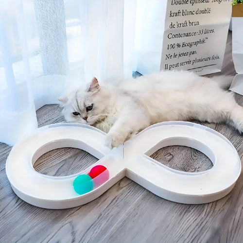 Rotating cat track toy with rolling balls and teasing stick on blue background