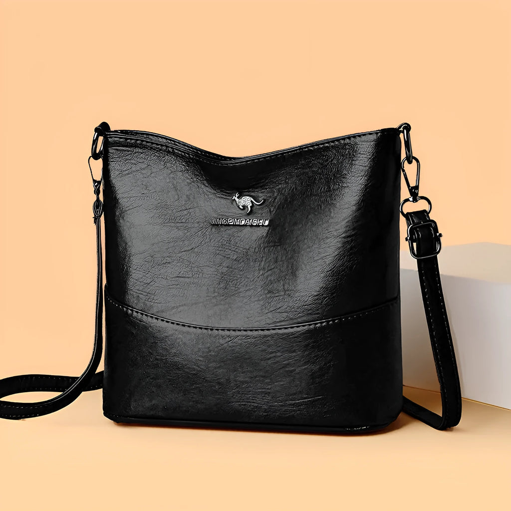 Women's large capacity soft leather shoulder bag in bucket style with sandwich pocket