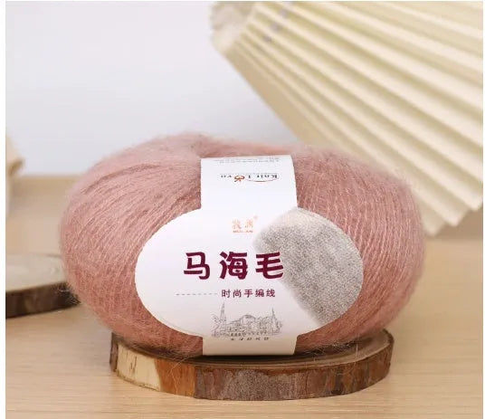 Mohair wool ball for DIY scarf knitting in assorted colours on white background