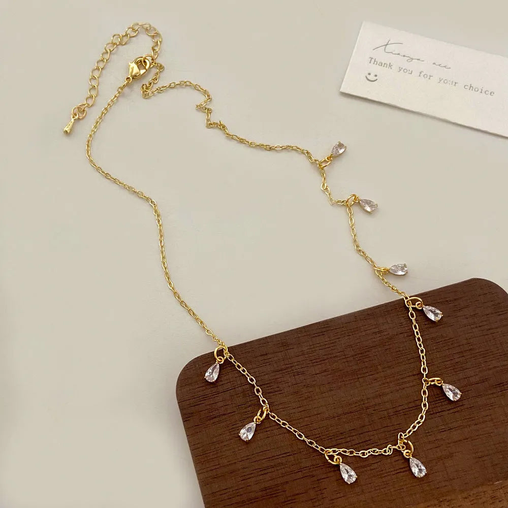 Women's zircon jewellery set with geometric pendant necklace, earrings and anklet
