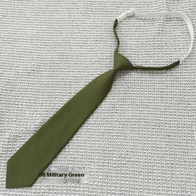 Solid navy blue men's cotton tie with arrow-type design on a white background.