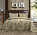 Blue American flower and bird pattern cotton bedspread set with three pieces shown on a bed