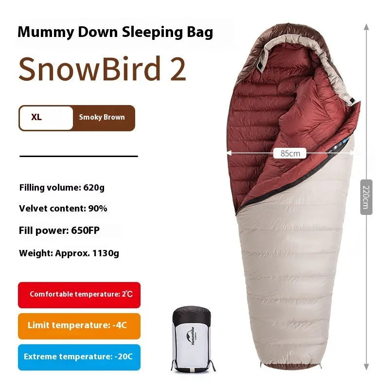 Goose down mummy style sleeping bag for adults with a storage bag.