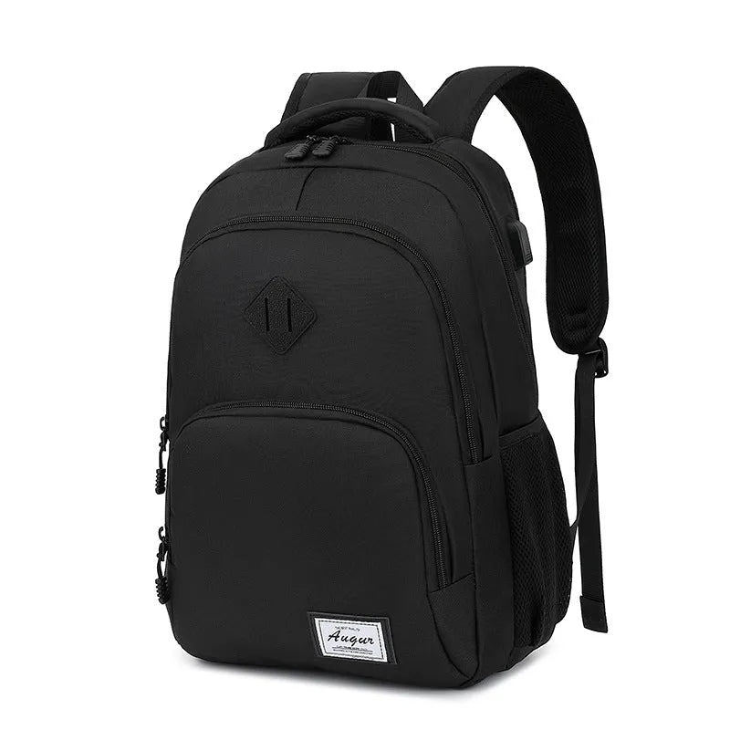 Gray nylon backpack with USB charging port and trolley sleeve on a suitcase.