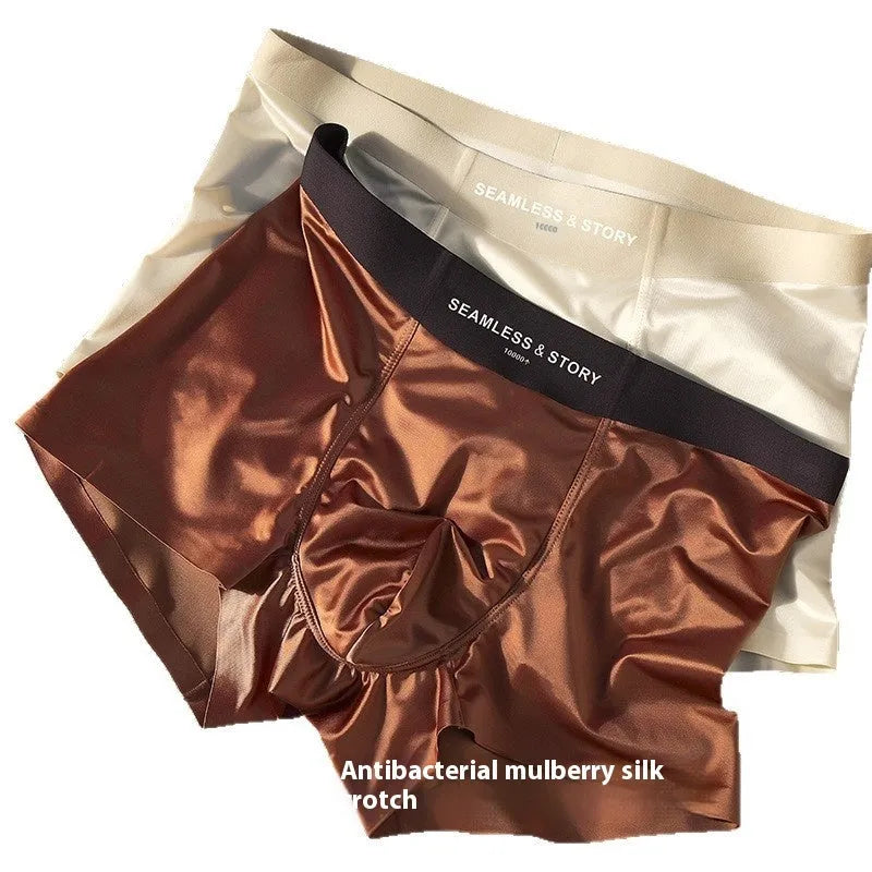 Men's solid colour ice silk nylon underwear in mid waist design on a neutral background.