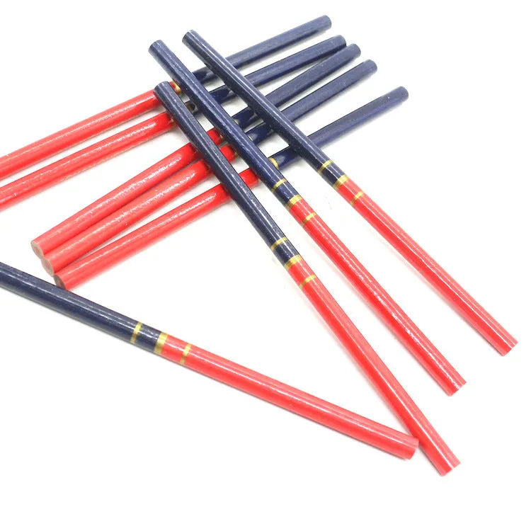 Ten red and blue wooden carpenter pencils with round barrels arranged together.