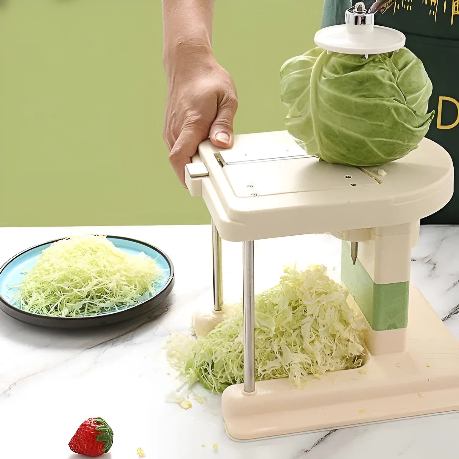 Beige kitchen vegetable slicer grater with stainless steel blades for spiralising and shredding