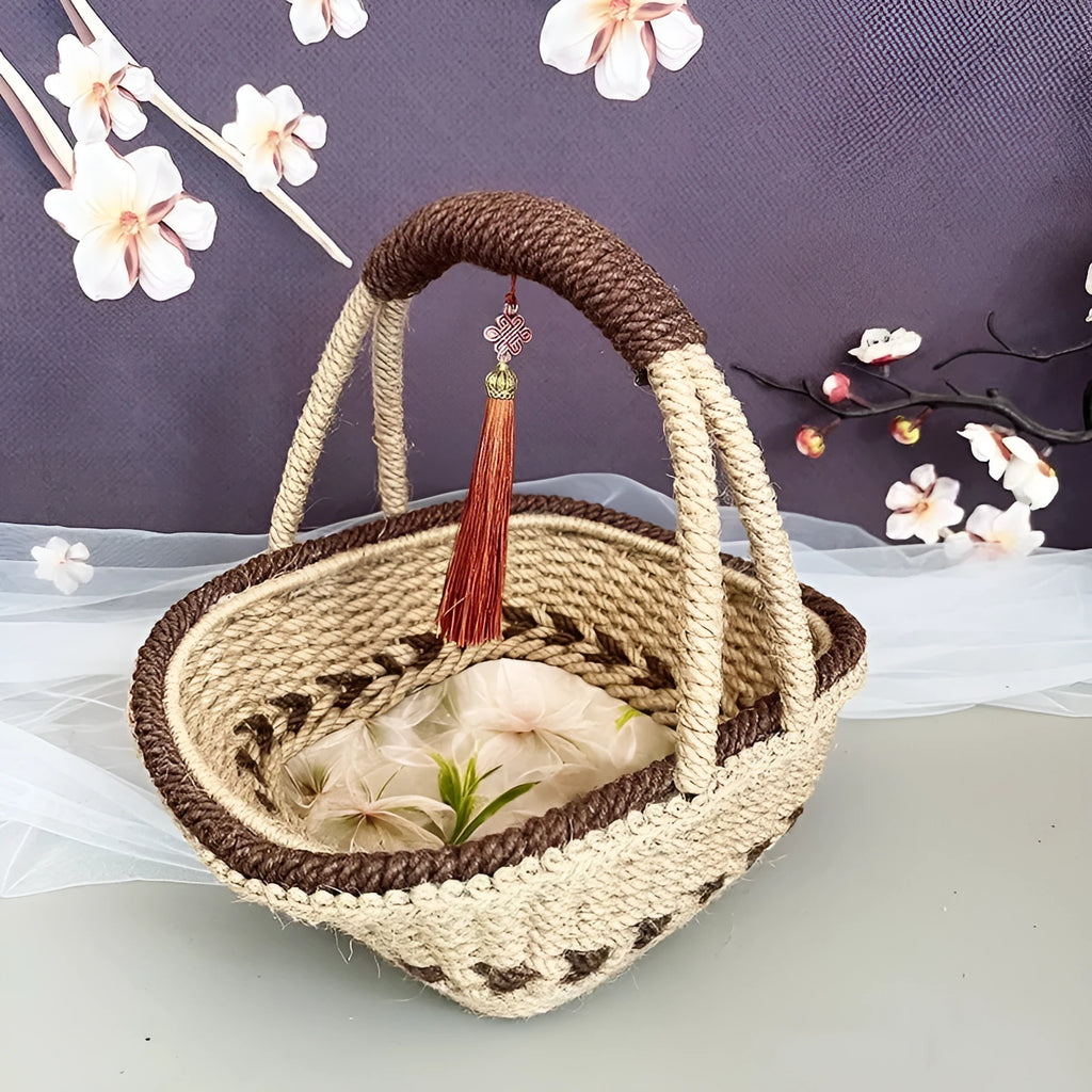 Small hand-woven straw basket in coffee brown colour on a wooden table.