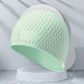 Adult silicone swimming cap with water drop design in various solid colours
