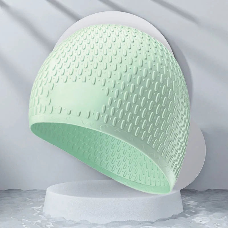 Adult silicone swimming cap with water drop design in various solid colours