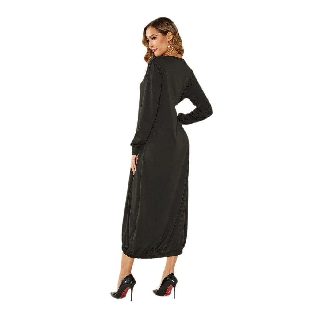 Black loose lace-up crew neck lantern dress with thread accents on hanger