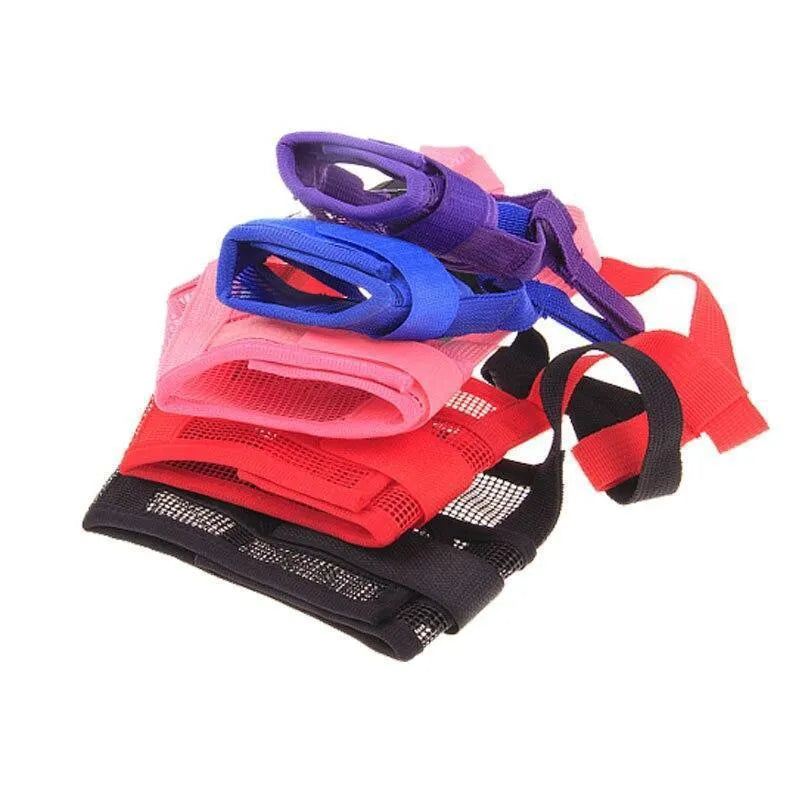 Adjustable plastic dog muzzle in various colours showing snout coverage and head strap attachment