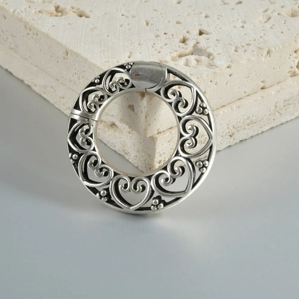 Retro heart-shaped and lotus magnetic earrings in antique silver and ancient gold finishes
