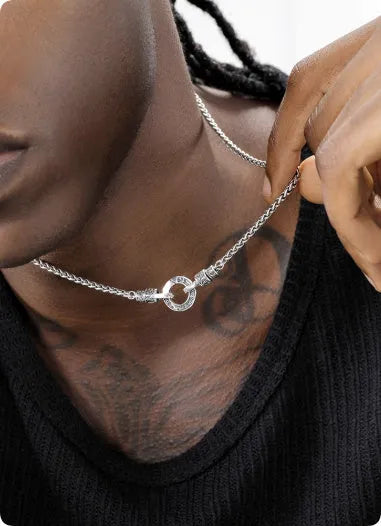 Silver 925 sterling silver clavicle necklace with pendant on a model.