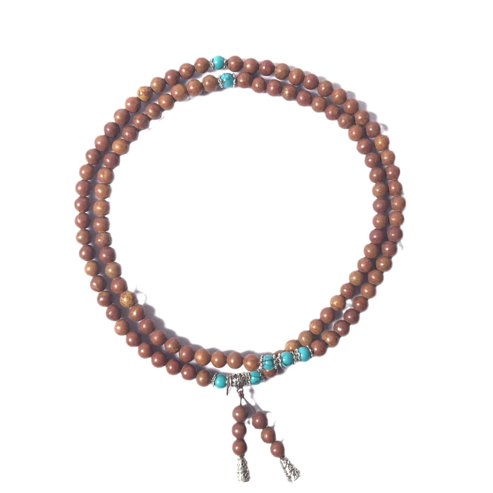 Handmade 108-bead lvzhu stone bracelet with 5-6mm geometric beads on wrist
