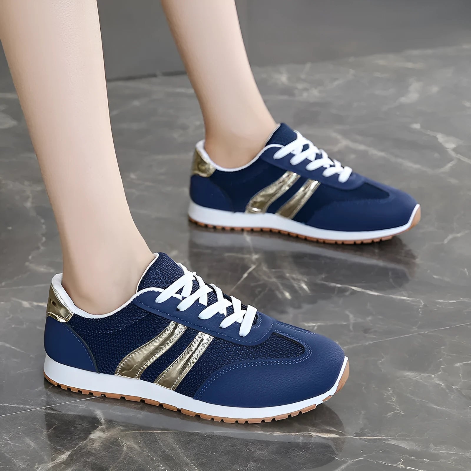 Blue women's casual sports shoes with cross shoulder straps and a lace-up front on a non-slip rubber sole.