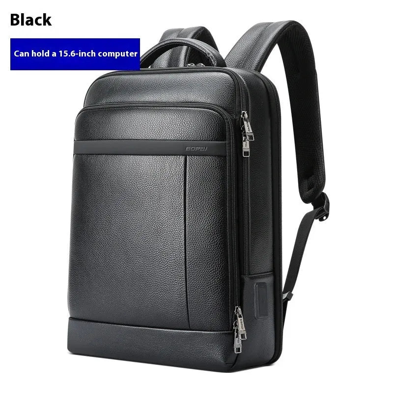 Black genuine cowhide leather commuter backpack with USB port and curved strap.
