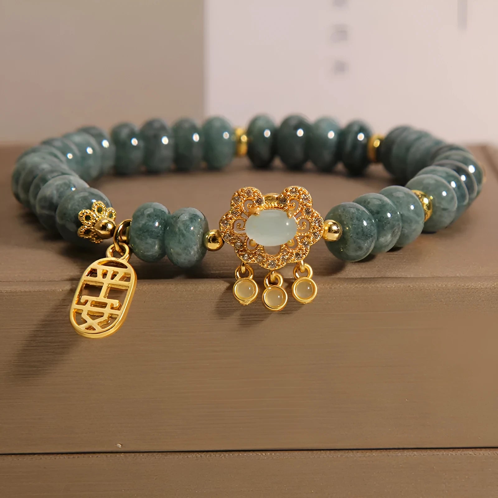 Natural green emerald jade bracelet with alloy safety lock and abacus beads pattern