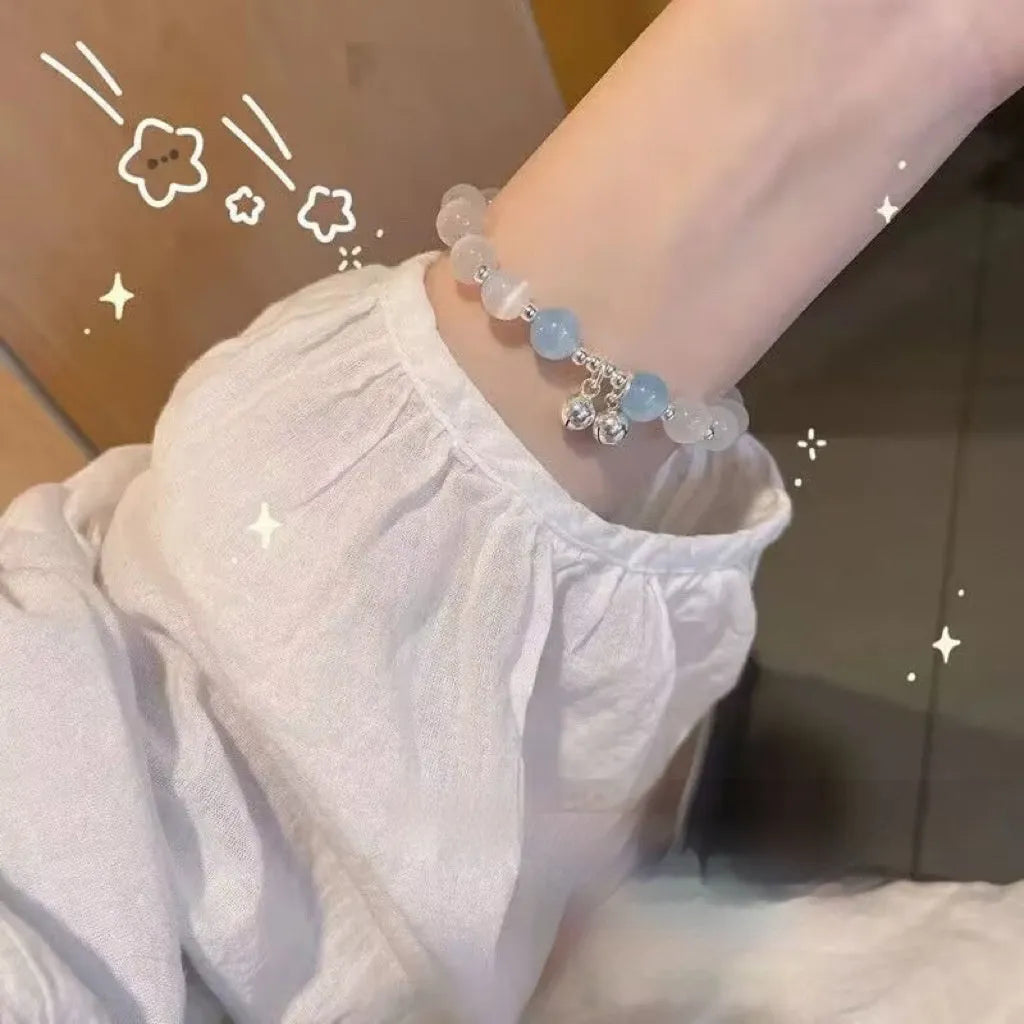 Handcrafted glass butterfly bracelet with drop-shaped moonlight grey beads and special-interest design