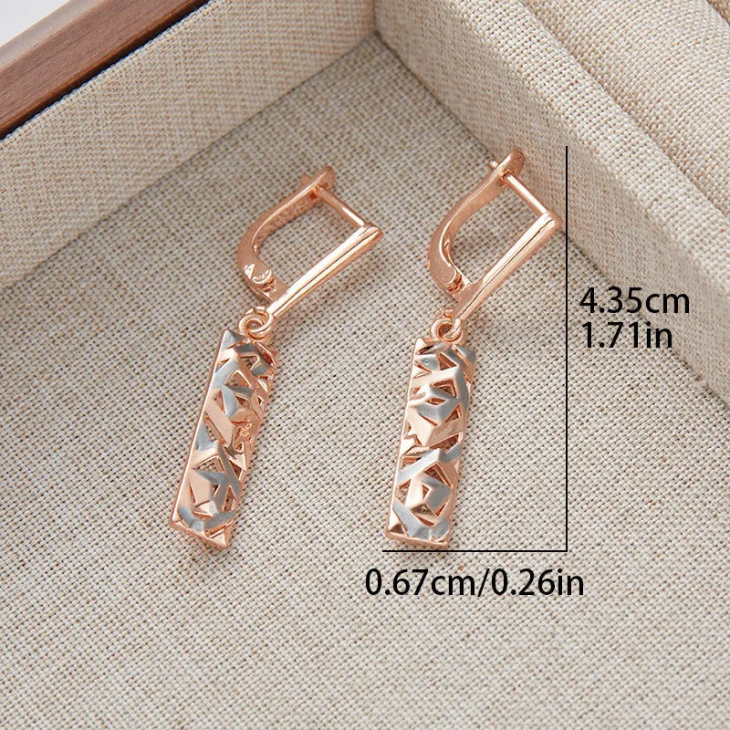 Two-tone rectangular hollow stud earrings for women, made from alloy with an electroplated finish.