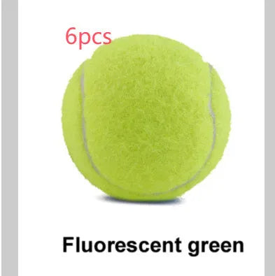 6.3 cm diameter solid rubber dog tennis ball in assorted bright colours on a green lawn.