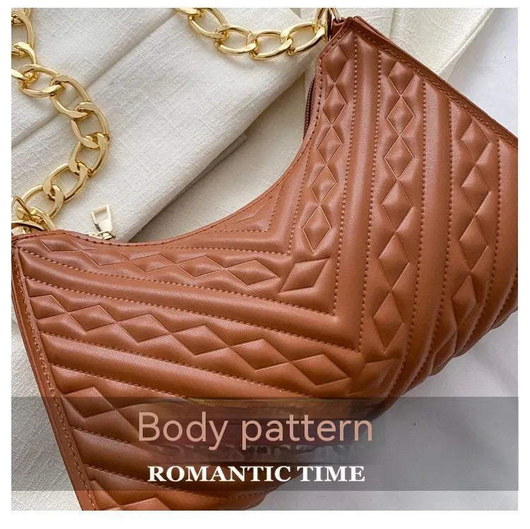 Soft PU leather pleated chain baguette shoulder bag in a vertical square shape, shown in brown colour.