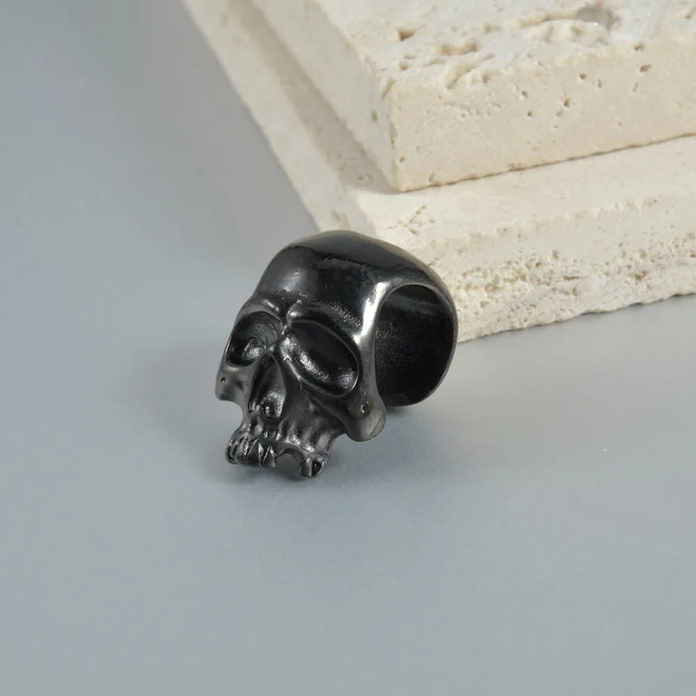 Stainless steel hollow skull Buddha earrings with geometric design in electroplated colours