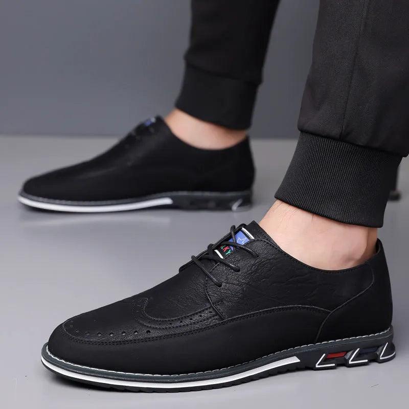 Men's black leather casual shoes with rubber sole and stitching detail