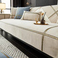 Chenille non-slip sofa cushion cover in solid colour cross wheat-beige on a modern sofa