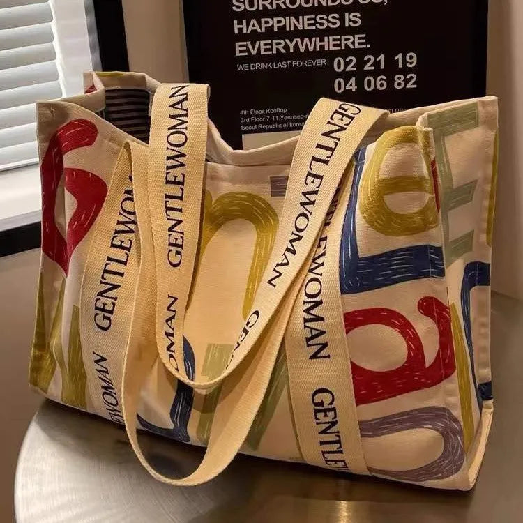 Canvas women's tote bag with printing detail in large capacity design