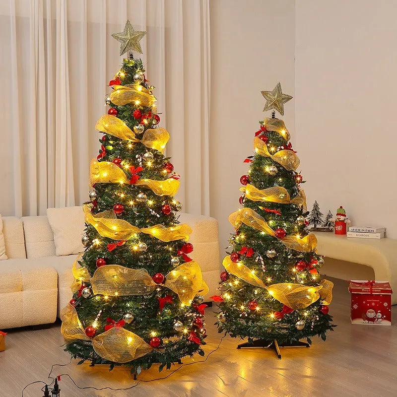 Green velvet foldable telescopic Christmas tree with warm lights on floor-standing base in indoor room setting
