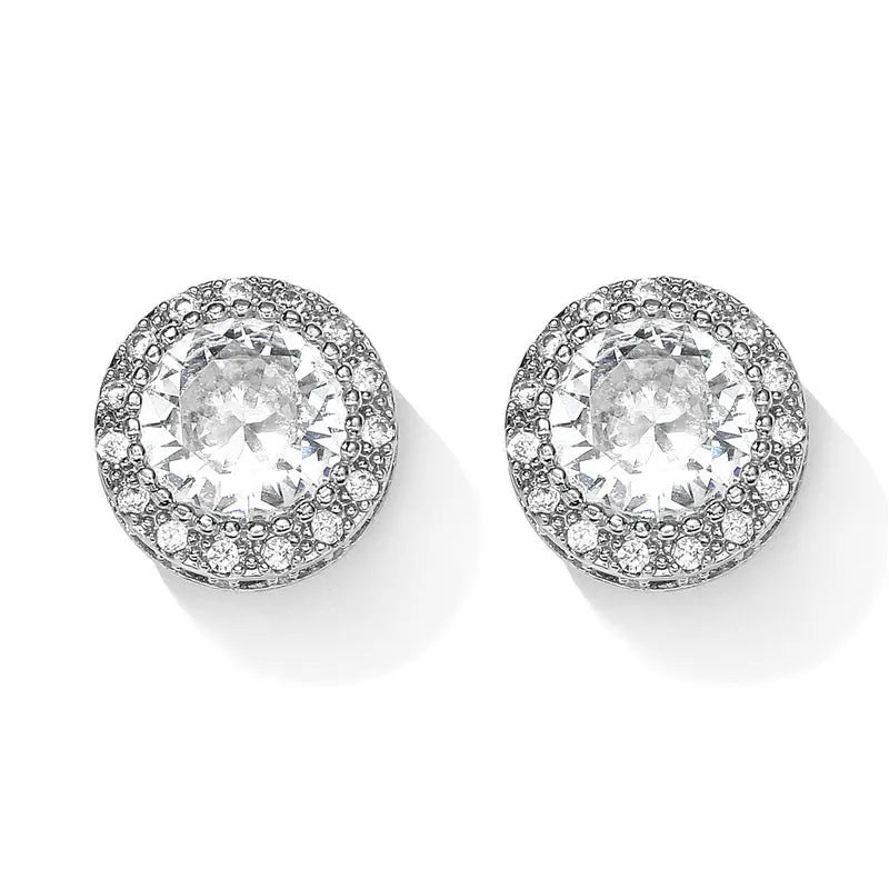 Round copper stud earrings with inlaid zircon in gold tone on white background
