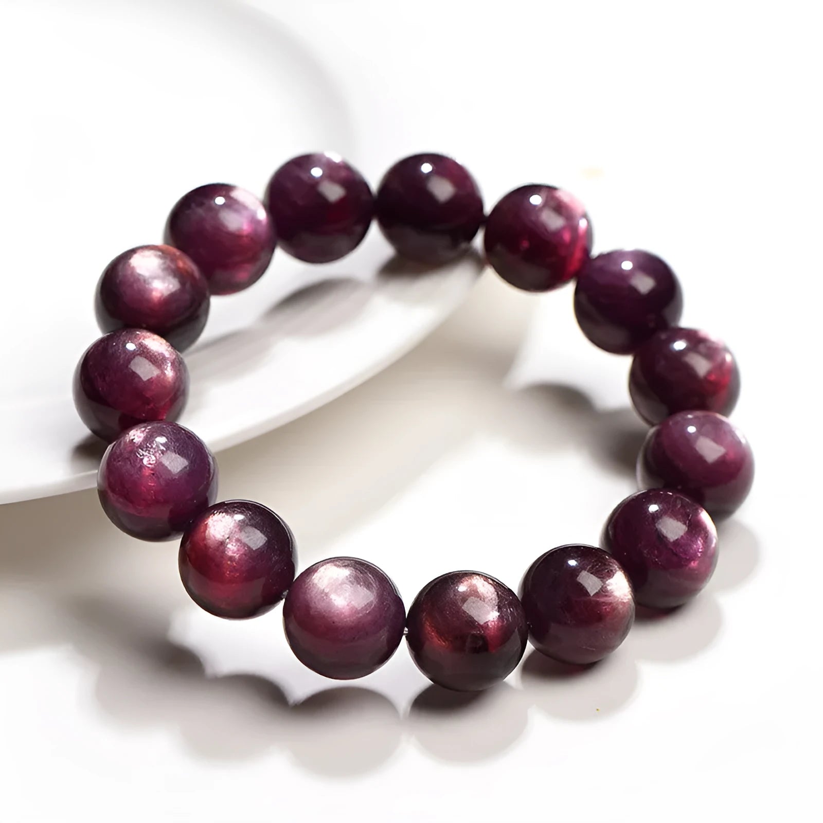 Natural purple lepidolite crystal bracelet with polished round beads in circular geometry
