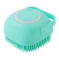 Blue silicone dog bath brush with handle for pet washing and massage during grooming