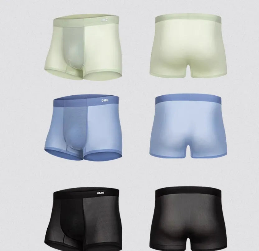 Men's seamless antibacterial fitness underwear shorts in a polyamide spandex blend on a grey background.