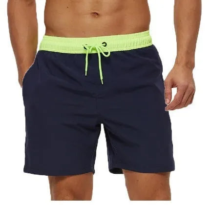 Men's blue fitness shorts with stitched waist headband, drawstring, zipper pocket, and padding for running