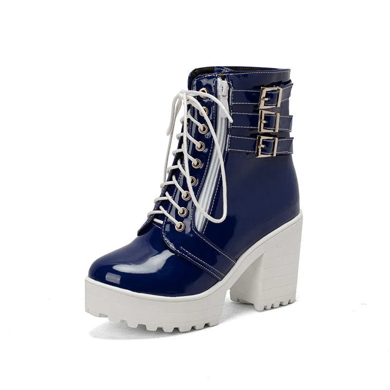 Women's black thick-heel ankle boots with round toe and front lace-up design.