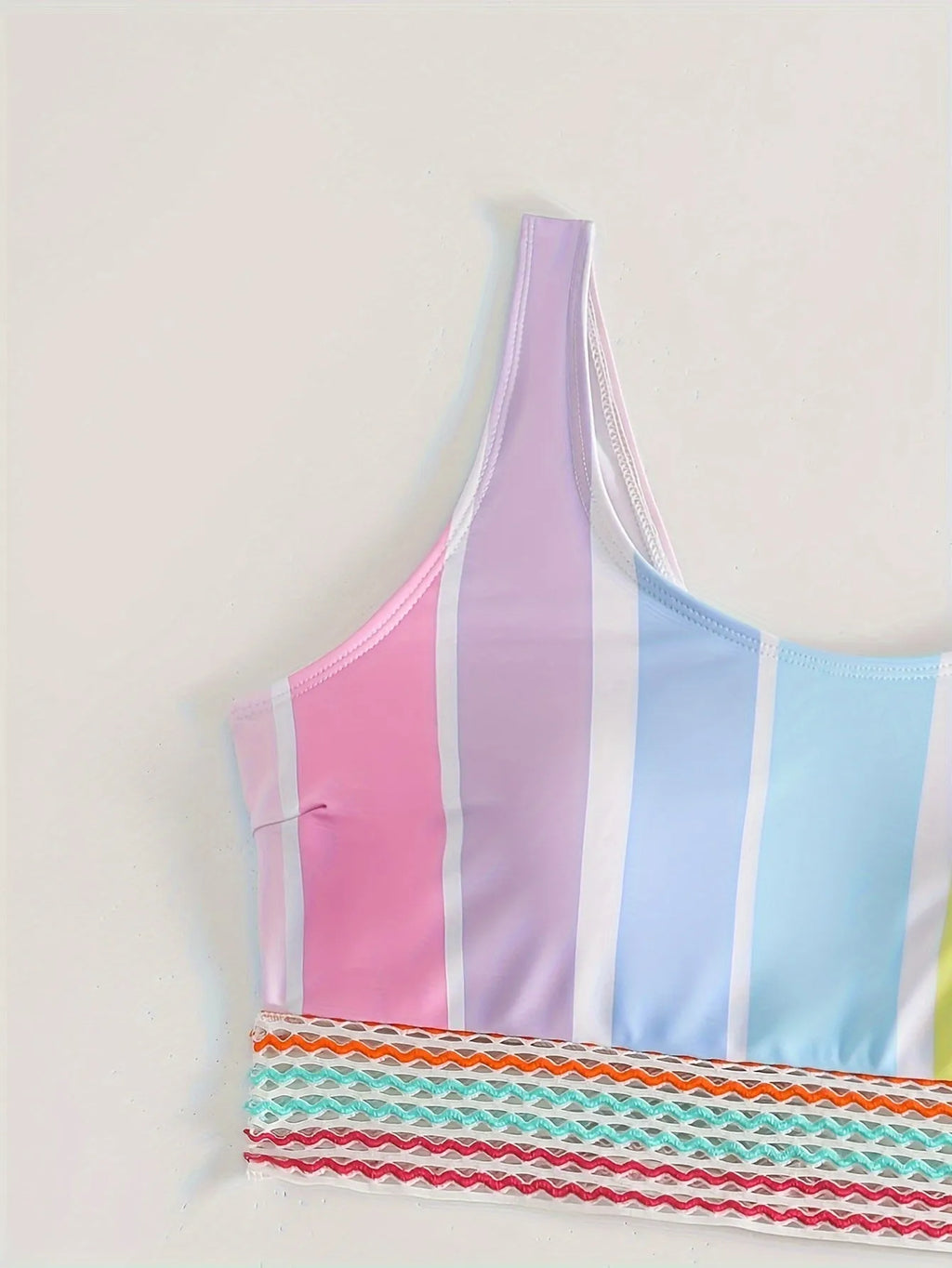 Women's striped bikini set with top and briefs for swimming and sports.