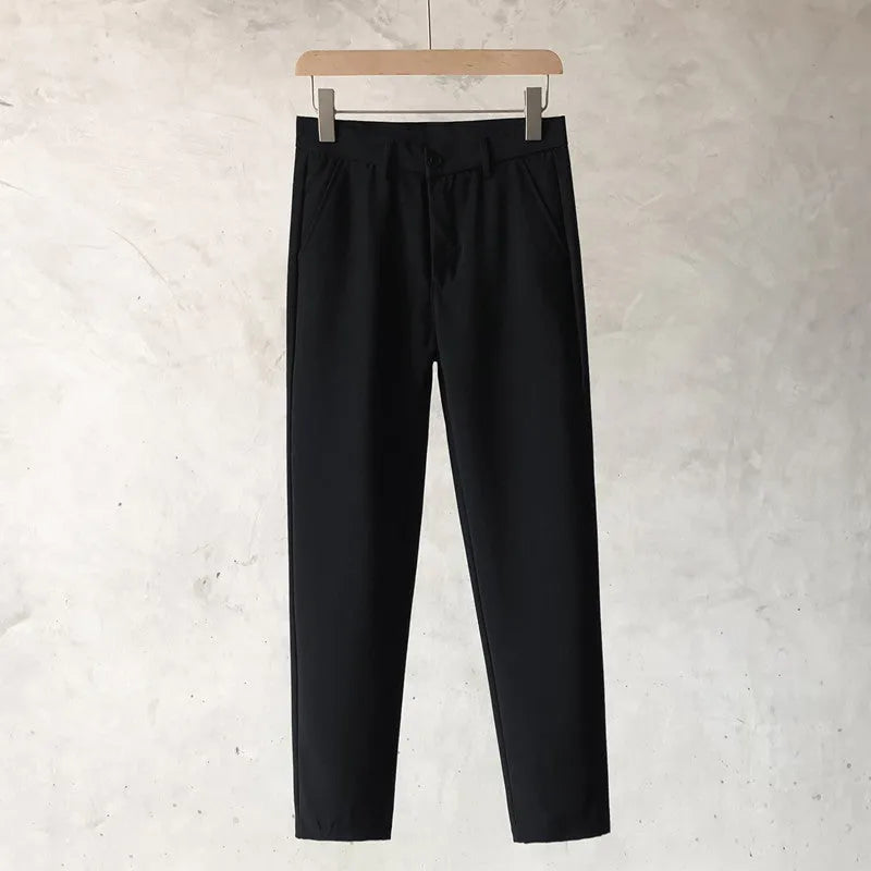 Boys slim straight wool trousers with tapered fit and straight leg opening in black colour