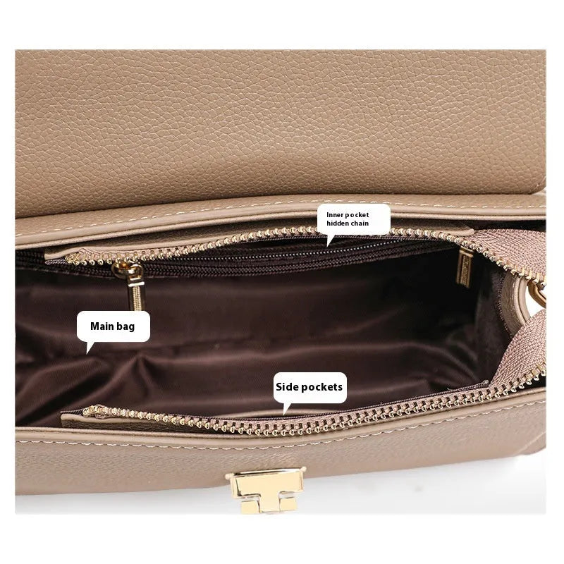 Elephant grey genuine leather handbag with litchi pattern texture and vintage lock closure