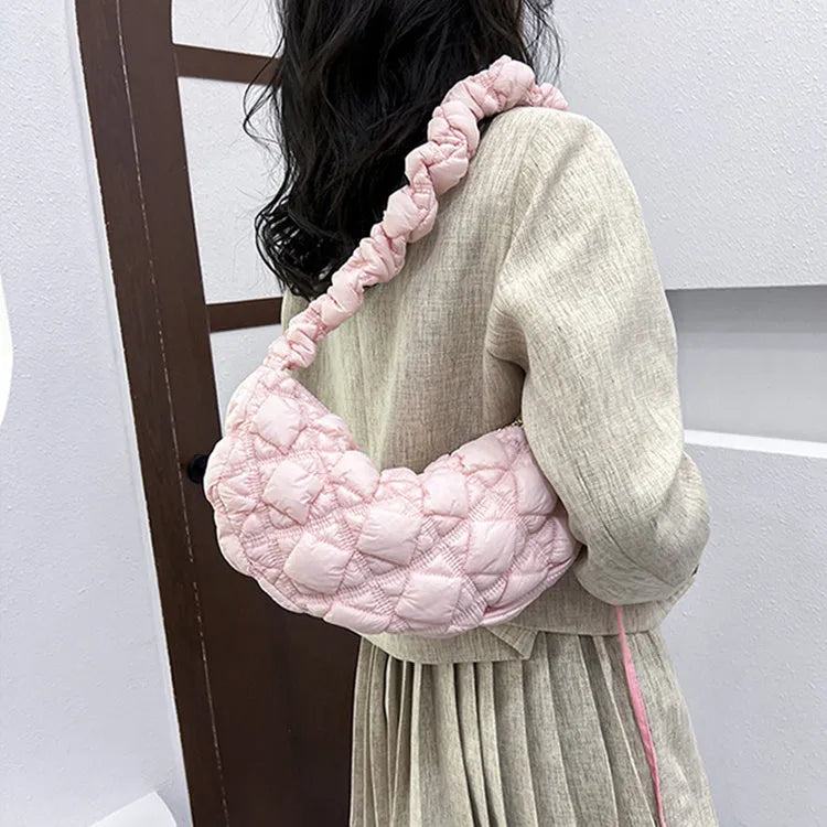 Women's nylon shoulder messenger bag in a solid colour with a long strap, showing front view.