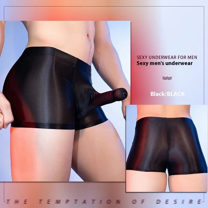 Men's red boxer shorts with an elephant nose pattern, showing mid-waist and seamless design.