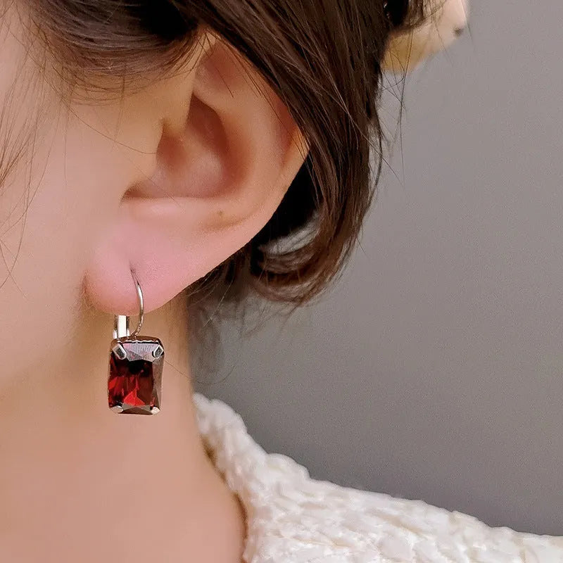 Women's square crystal earrings in purple colour on copper base, 25x10mm size pair