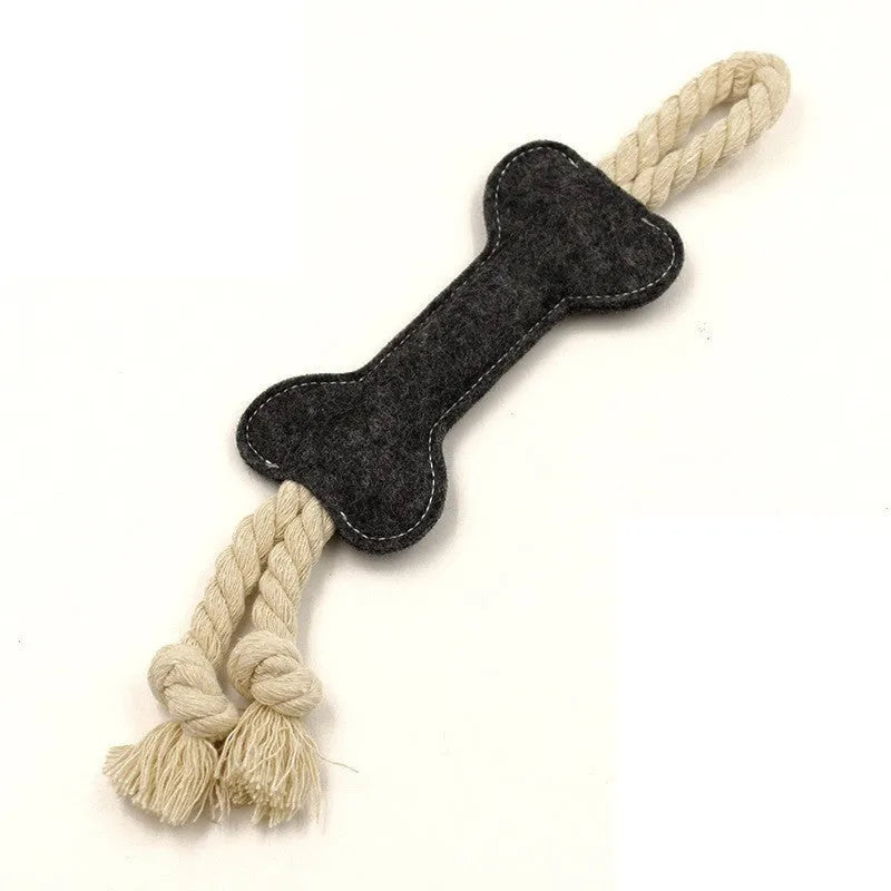 Bone-shaped dog chew toy in felt fabric with rope detailing, shown in various colours