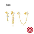 Three pairs of geometric zircon tassel earrings in sterling silver with gold tone variations
