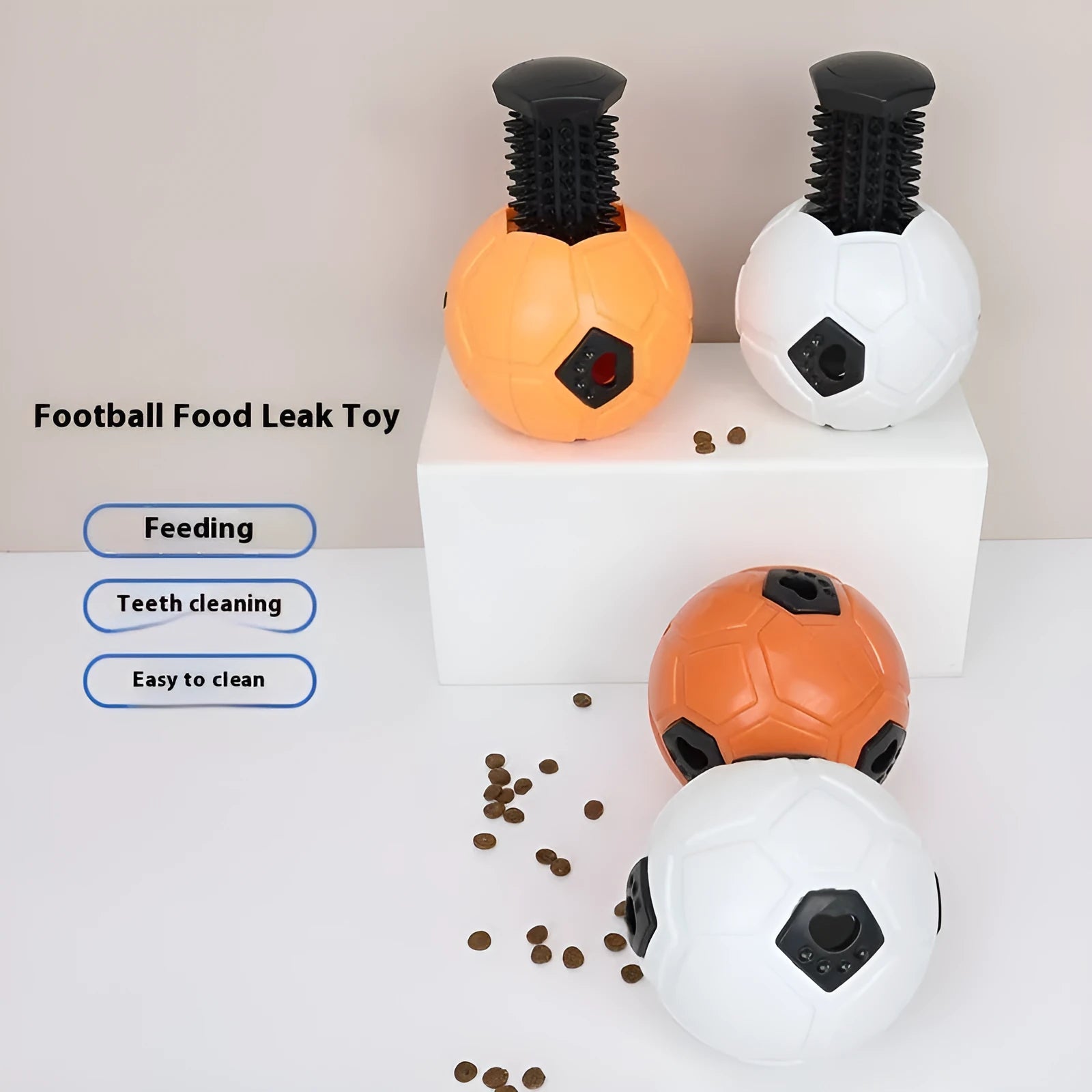 Orange and white TPR dog chew balls showing hollow and teeth cleaning stick styles