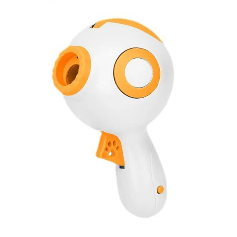 Green, orange, and pink dog treat launcher toy for interactive feeding and training