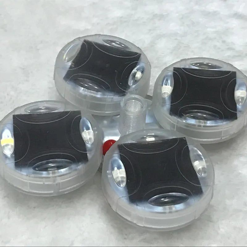 Solar-powered LED hub decorative lights mounted on vehicle wheel with multiple flash modes