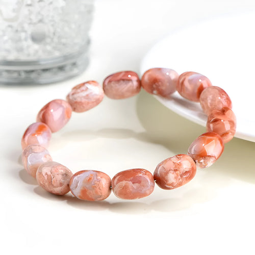 Natural cherry agate bracelet with 10x14mm barrel beads and traditional Ruyi design elements