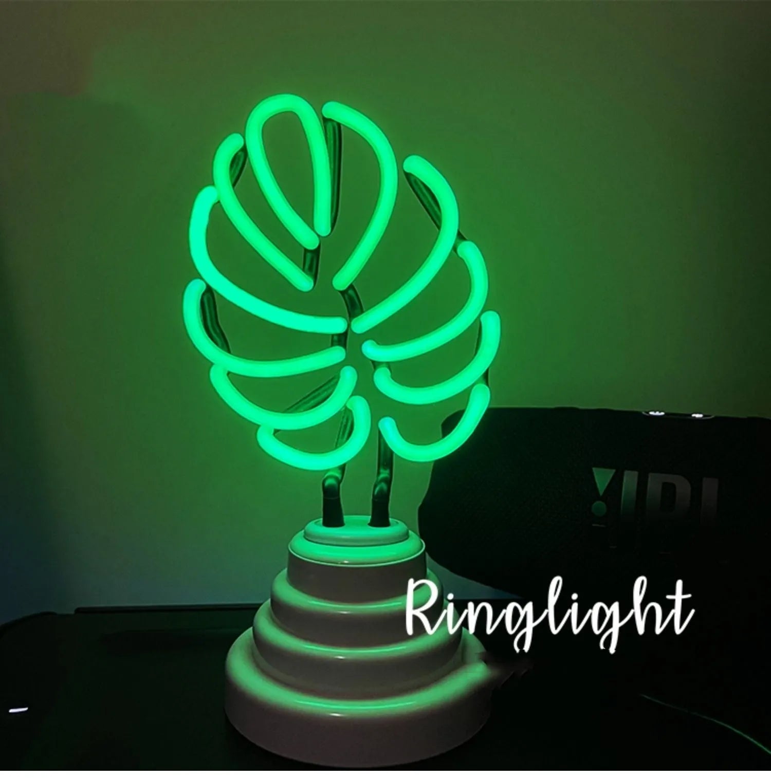 Minimalist bamboo-shaped white and green desktop lamp with USB cable in two size options.